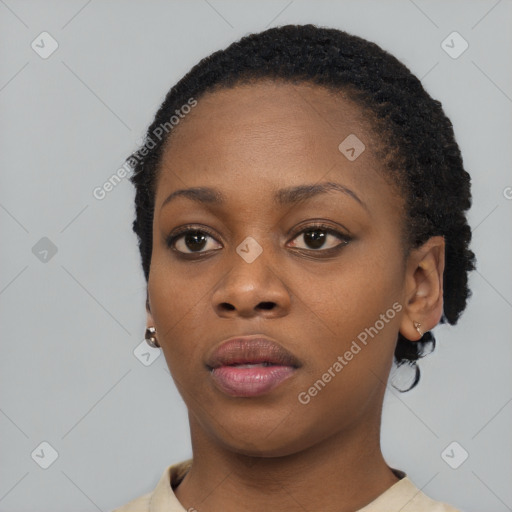 Neutral black young-adult female with short  black hair and brown eyes