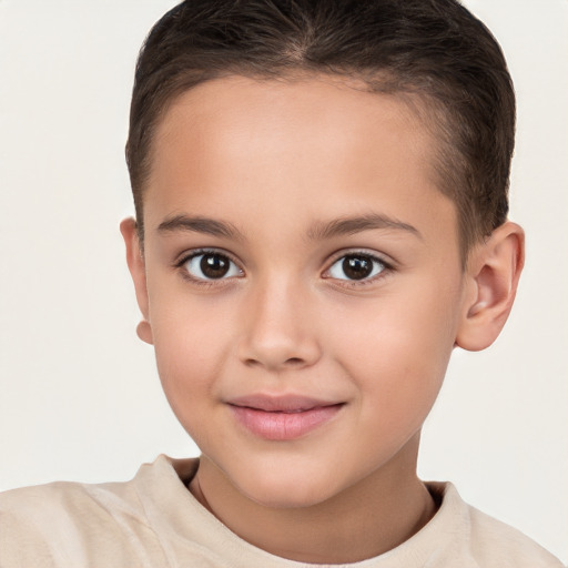 Joyful white child female with short  brown hair and brown eyes