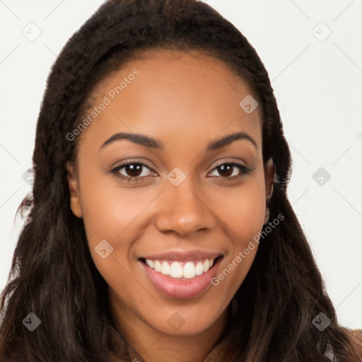 Joyful latino young-adult female with long  brown hair and brown eyes