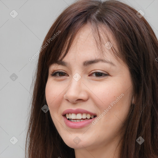 Joyful white young-adult female with long  brown hair and brown eyes