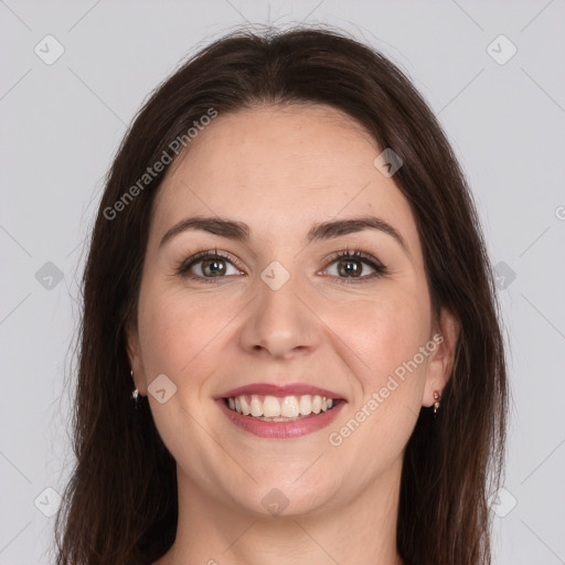 Joyful white young-adult female with long  brown hair and grey eyes