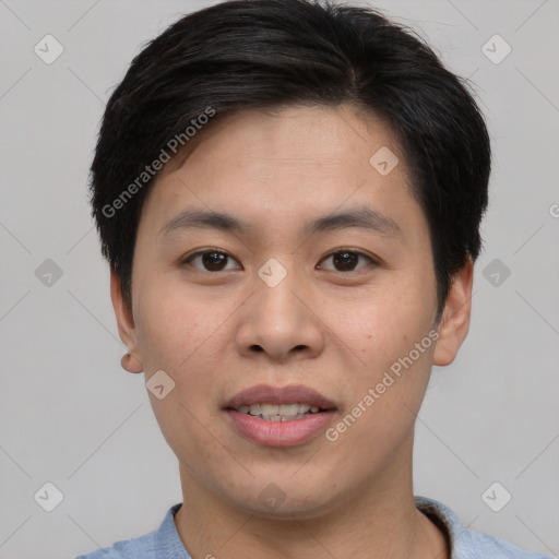 Joyful asian young-adult male with short  brown hair and brown eyes