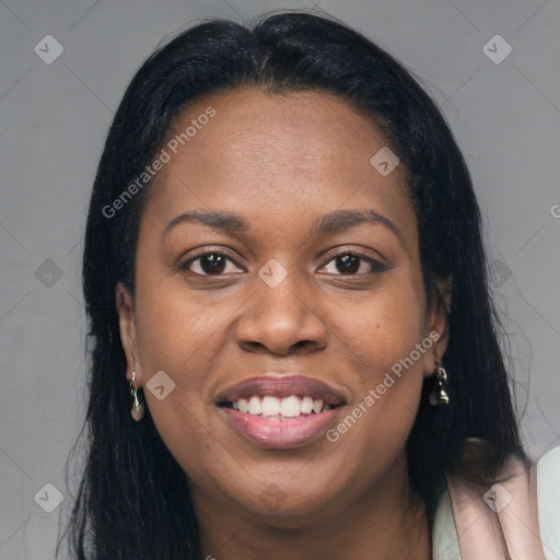 Joyful black young-adult female with long  brown hair and brown eyes