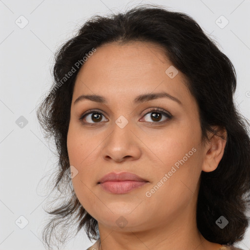 Joyful latino young-adult female with medium  brown hair and brown eyes