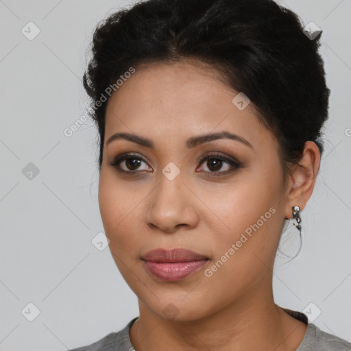 Joyful latino young-adult female with short  brown hair and brown eyes