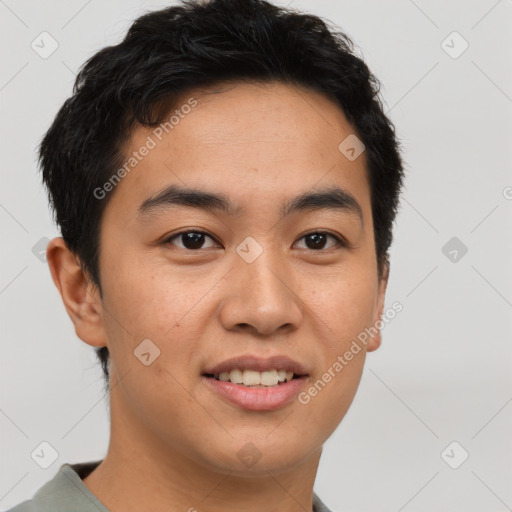 Joyful asian young-adult male with short  brown hair and brown eyes