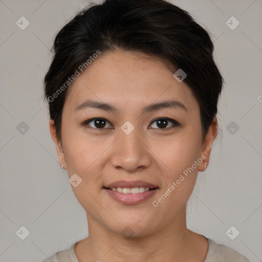 Joyful asian young-adult female with short  brown hair and brown eyes