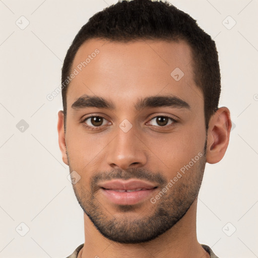 Neutral latino young-adult male with short  black hair and brown eyes