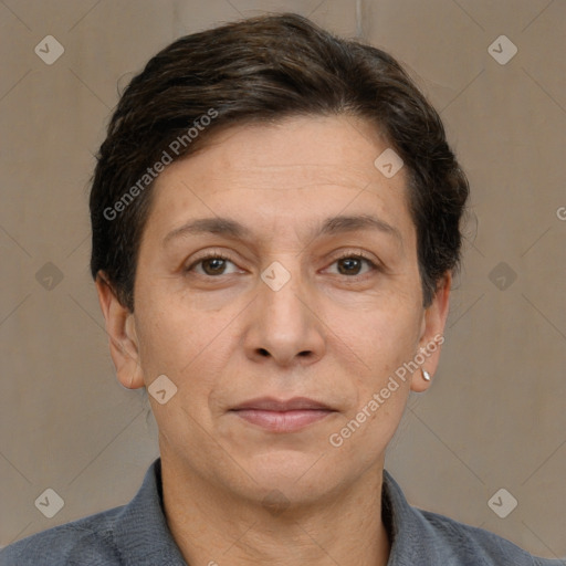 Joyful white adult female with short  brown hair and brown eyes
