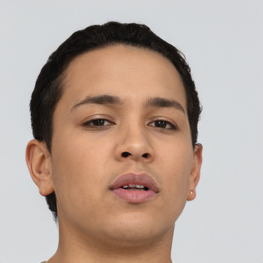 Neutral latino young-adult male with short  black hair and brown eyes