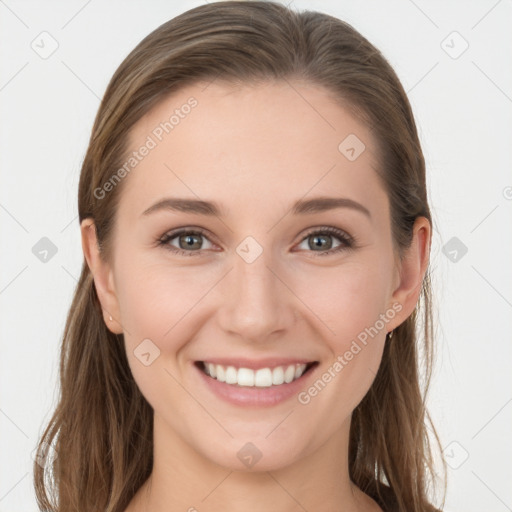 Joyful white young-adult female with long  brown hair and grey eyes