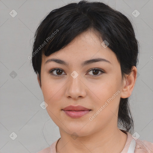 Joyful asian young-adult female with medium  black hair and brown eyes