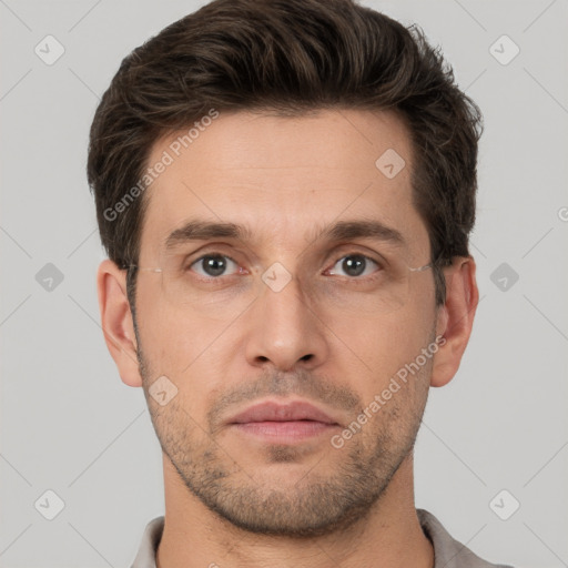 Neutral white young-adult male with short  brown hair and brown eyes