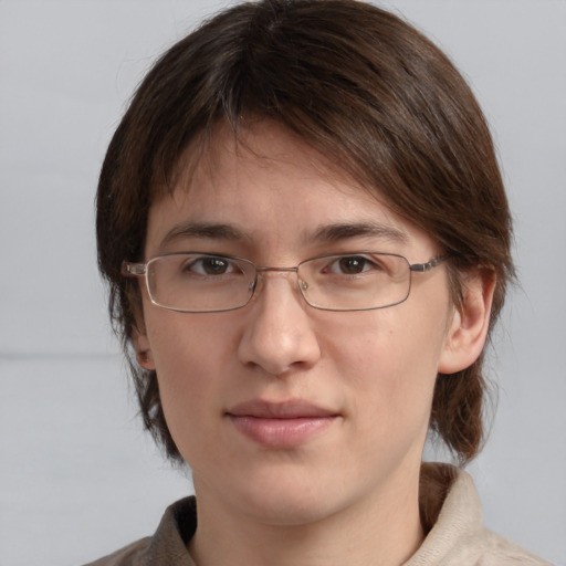 Joyful white young-adult male with medium  brown hair and brown eyes