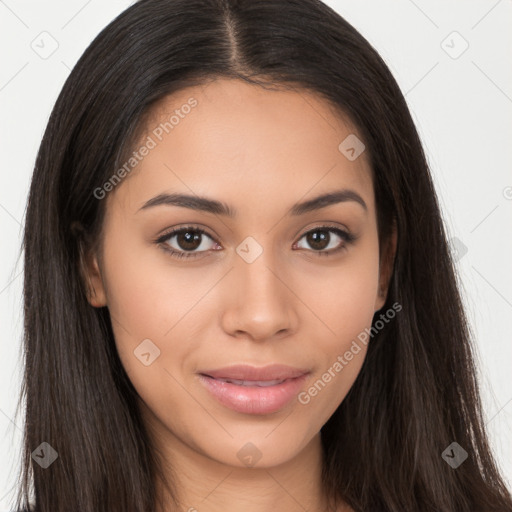 Joyful latino young-adult female with long  brown hair and brown eyes