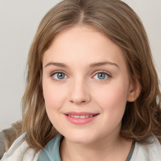 Joyful white young-adult female with medium  brown hair and blue eyes