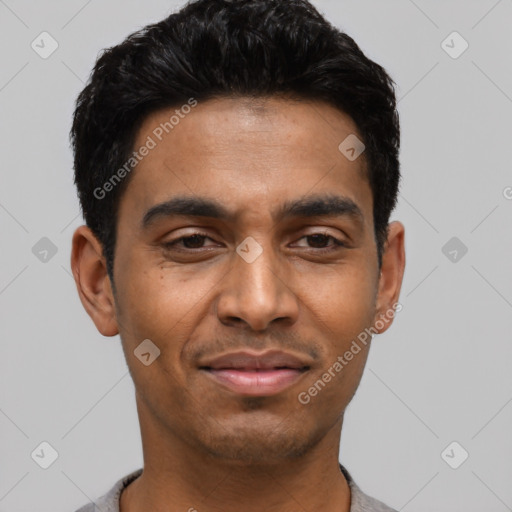 Joyful latino young-adult male with short  black hair and brown eyes