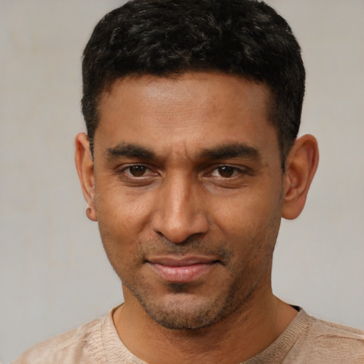 Neutral latino young-adult male with short  black hair and brown eyes