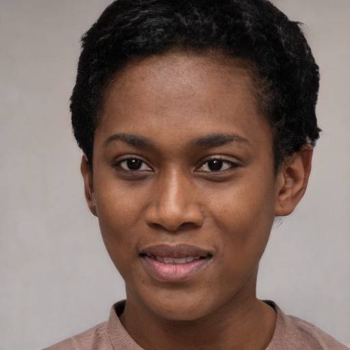 Joyful latino young-adult female with short  black hair and brown eyes