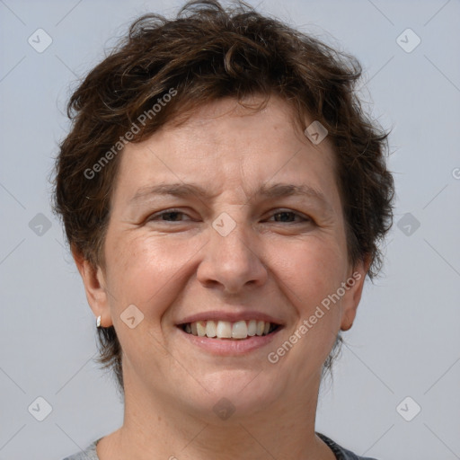 Joyful white adult female with short  brown hair and brown eyes