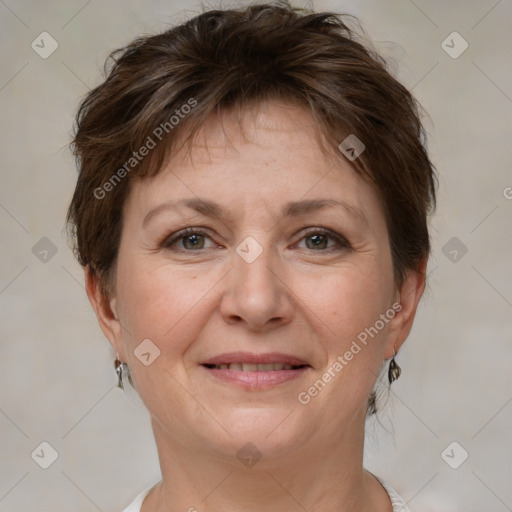 Joyful white adult female with short  brown hair and brown eyes