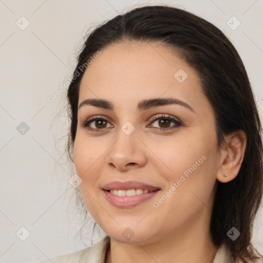 Joyful white young-adult female with medium  brown hair and brown eyes