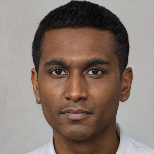 Neutral black young-adult male with short  black hair and brown eyes
