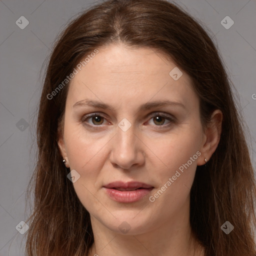 Joyful white young-adult female with long  brown hair and grey eyes