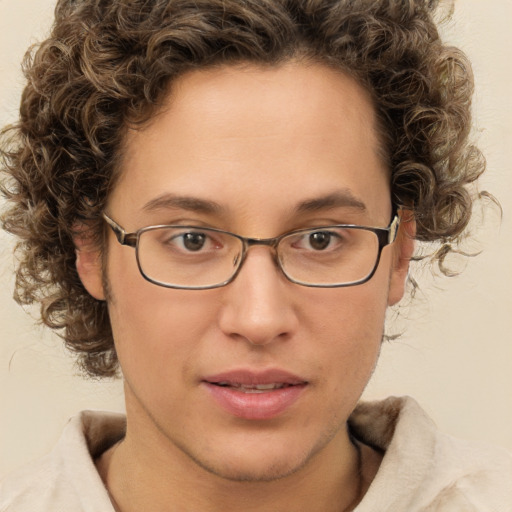 Joyful white young-adult female with short  brown hair and green eyes