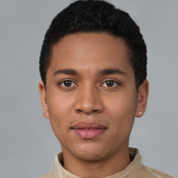 Joyful latino young-adult male with short  brown hair and brown eyes