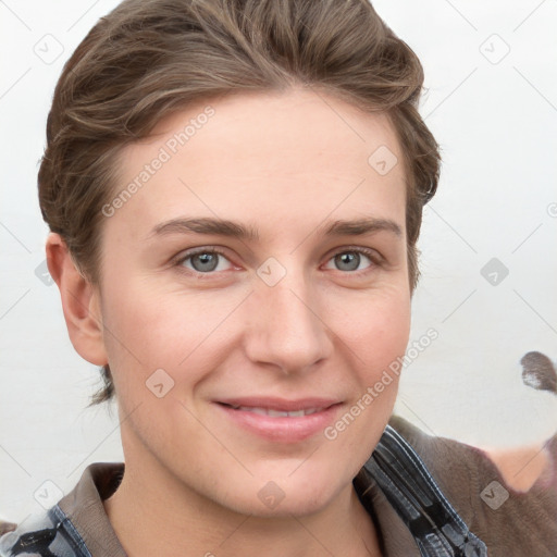 Joyful white young-adult female with short  brown hair and grey eyes