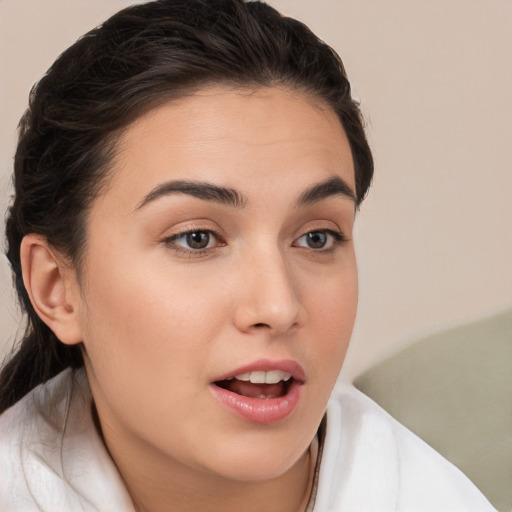 Neutral white young-adult female with medium  brown hair and brown eyes