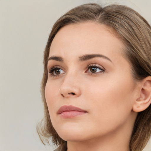 Neutral white young-adult female with medium  brown hair and brown eyes