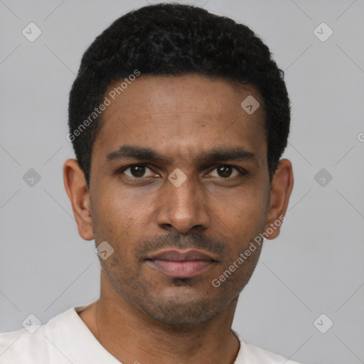 Neutral latino young-adult male with short  black hair and brown eyes