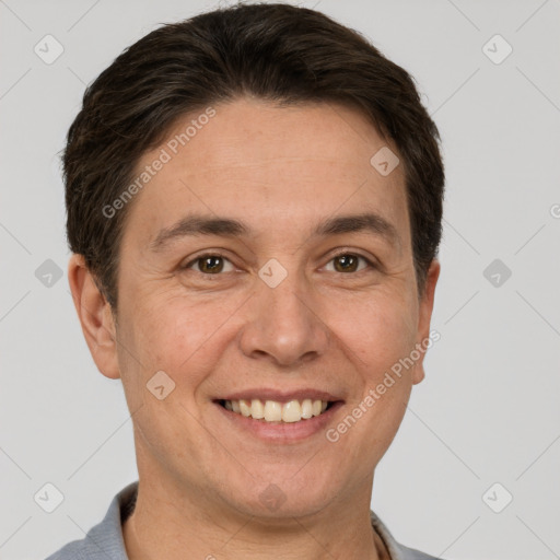 Joyful white adult male with short  brown hair and brown eyes