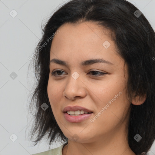 Joyful asian young-adult female with long  brown hair and brown eyes