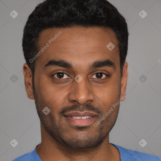 Joyful latino young-adult male with short  black hair and brown eyes
