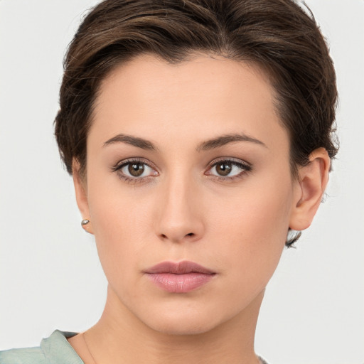 Neutral white young-adult female with short  brown hair and brown eyes