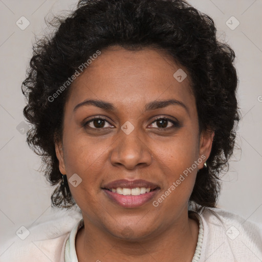 Joyful black young-adult female with medium  brown hair and brown eyes