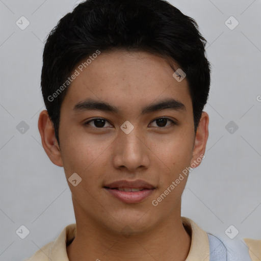 Joyful asian young-adult male with short  brown hair and brown eyes