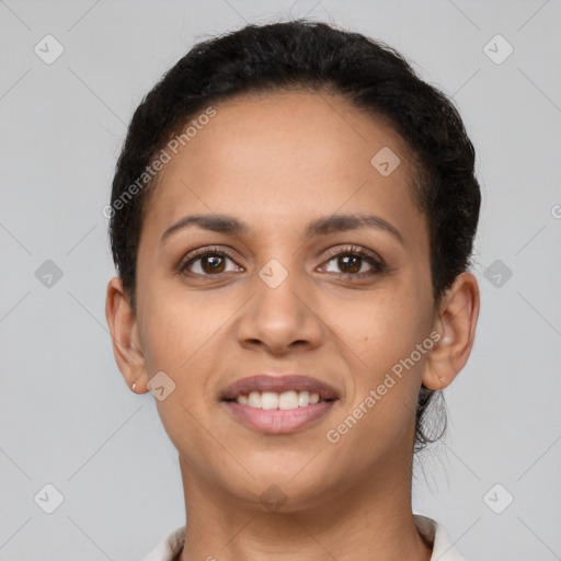 Joyful latino young-adult female with short  brown hair and brown eyes