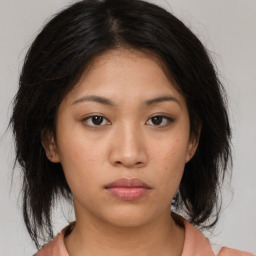 Neutral asian young-adult female with medium  brown hair and brown eyes