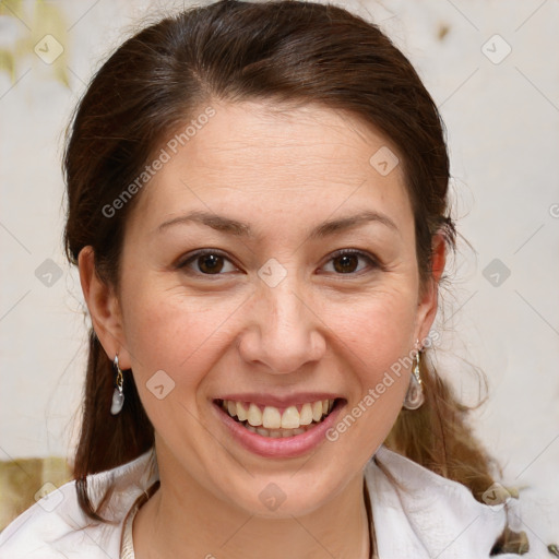 Joyful white adult female with medium  brown hair and brown eyes