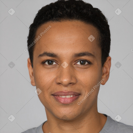 Joyful black young-adult male with short  black hair and brown eyes