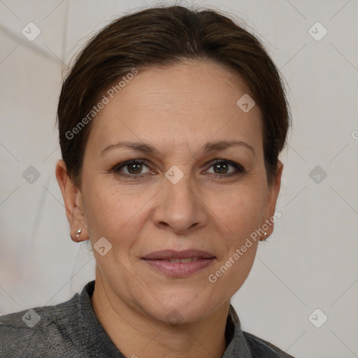 Joyful white adult female with short  brown hair and brown eyes