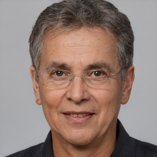 Joyful white middle-aged male with short  brown hair and brown eyes