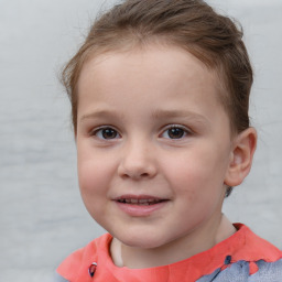 Joyful white child female with short  brown hair and brown eyes