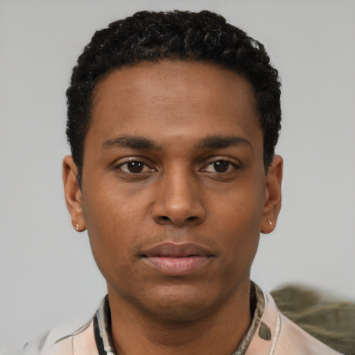 Neutral black young-adult male with short  black hair and brown eyes