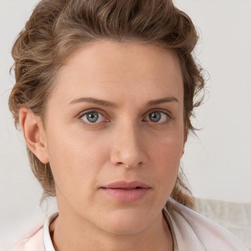 Neutral white young-adult female with medium  brown hair and blue eyes