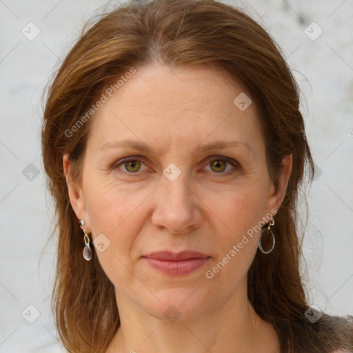 Joyful white adult female with medium  brown hair and brown eyes